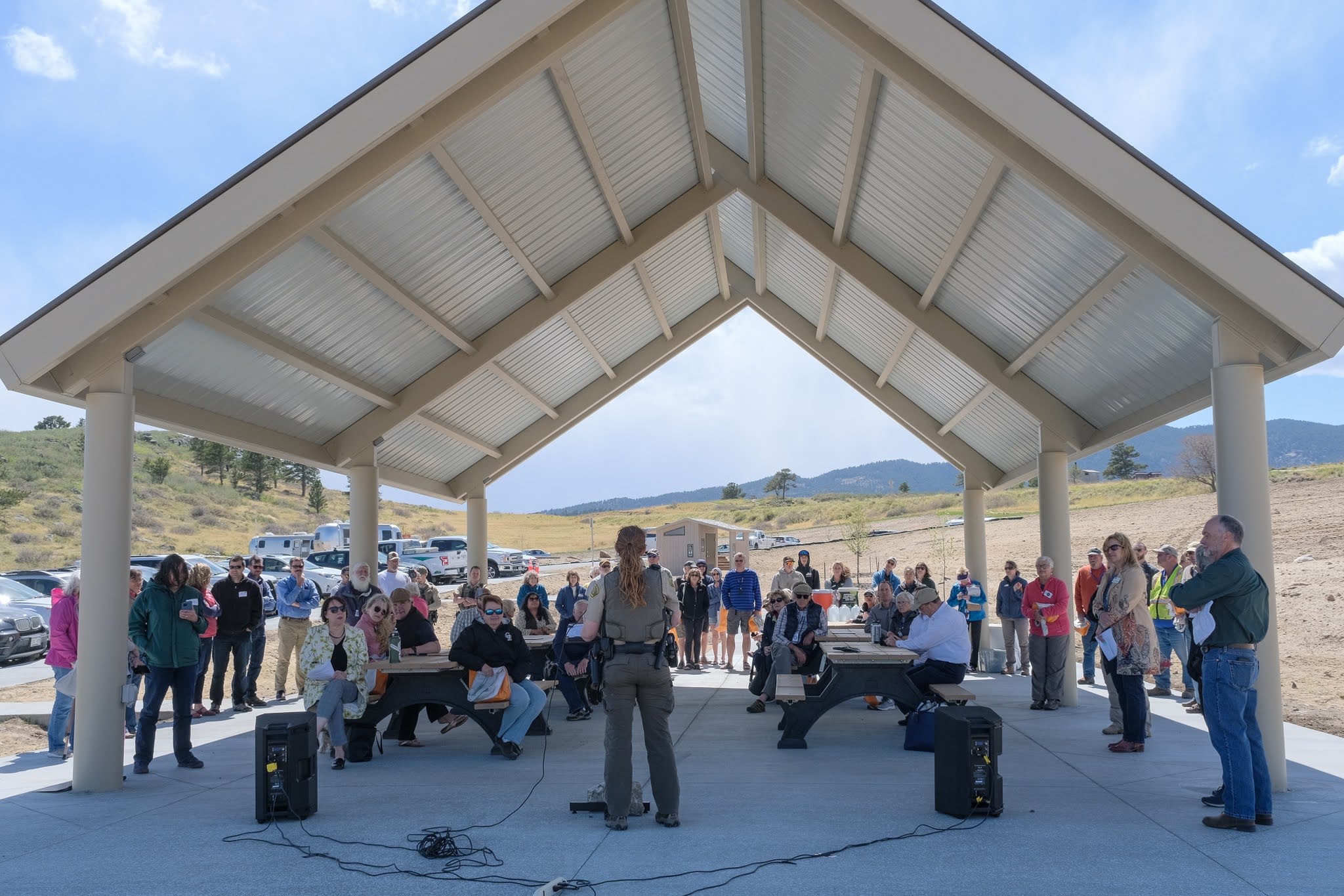 Image 5: Cindy Claggett, Carter Lake District Manager, addresses the crowd at the Sky View Campground ribbon cutting May 12, 2022.