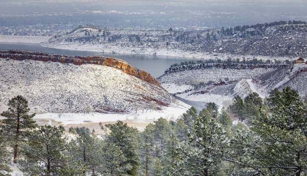 Horsetooth Mountain trails and forest with hiker