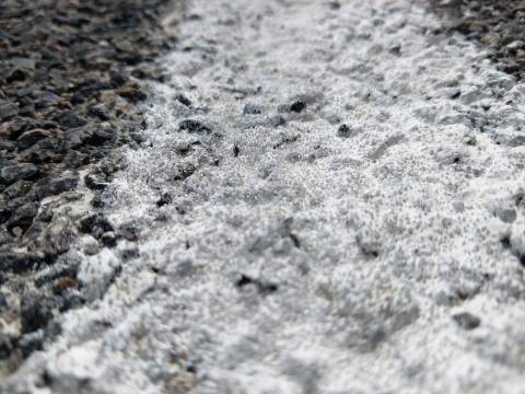 White pavement paint with glass beads