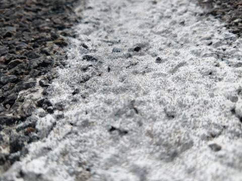 White pavement paint with glass beads White pavement paint with glass beads
